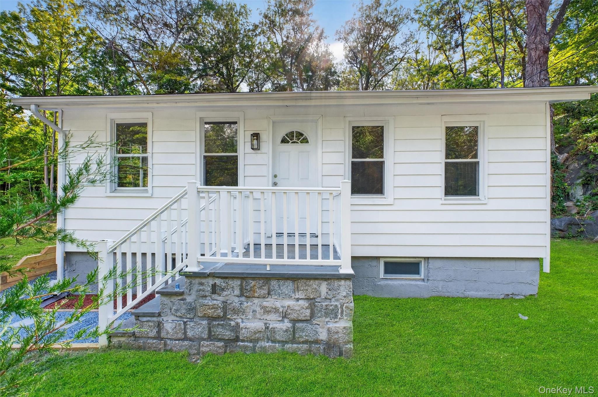 Completely updated two bedroom cottage with eat-in-kitchen, large yard...