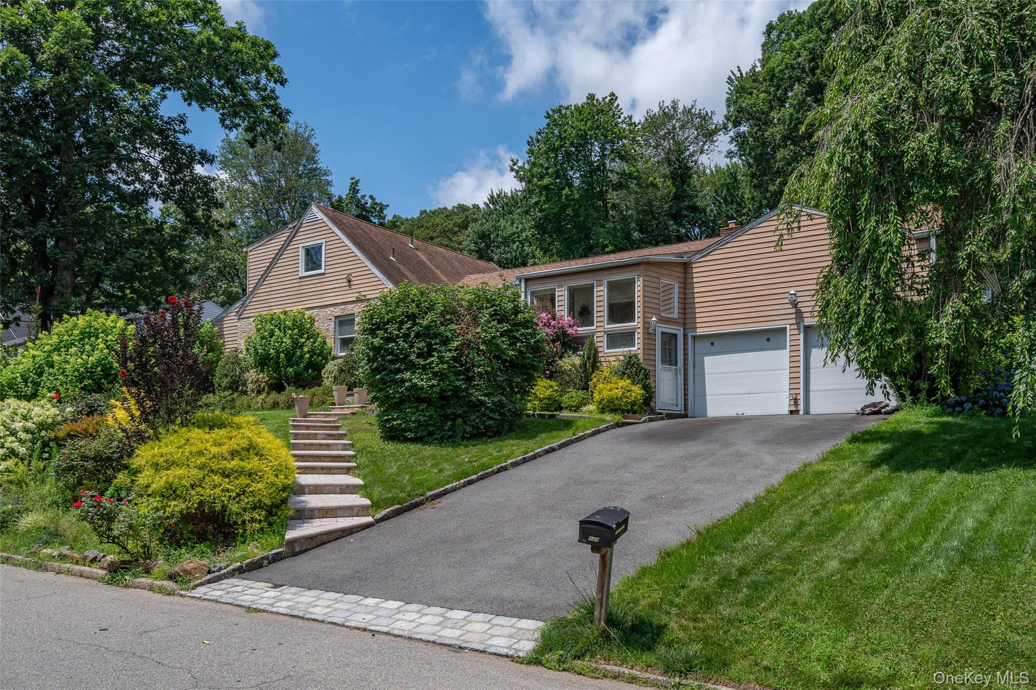 Welcome to 130 Wood Hollow Lane. Beautifully updated 5 bedroom, 3 bath...