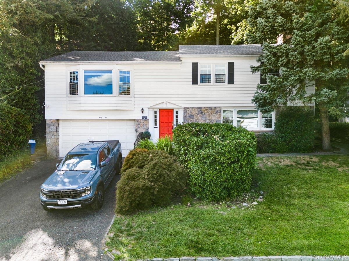 Welcome to this exquisite 3-bedroom, 2-bath raised ranch home tucked a...