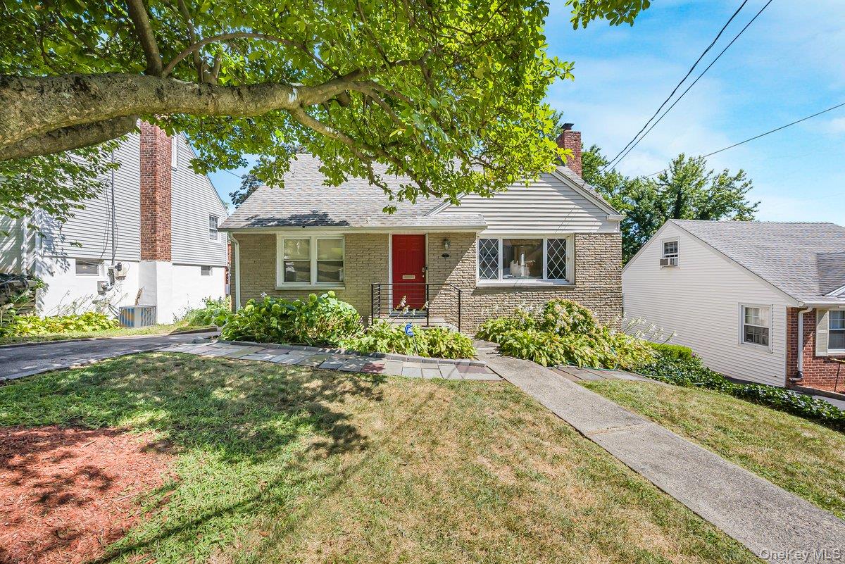 Welcome to this sun-drenched 4-bedroom, 1.5-bath Cape Cod-style home n...