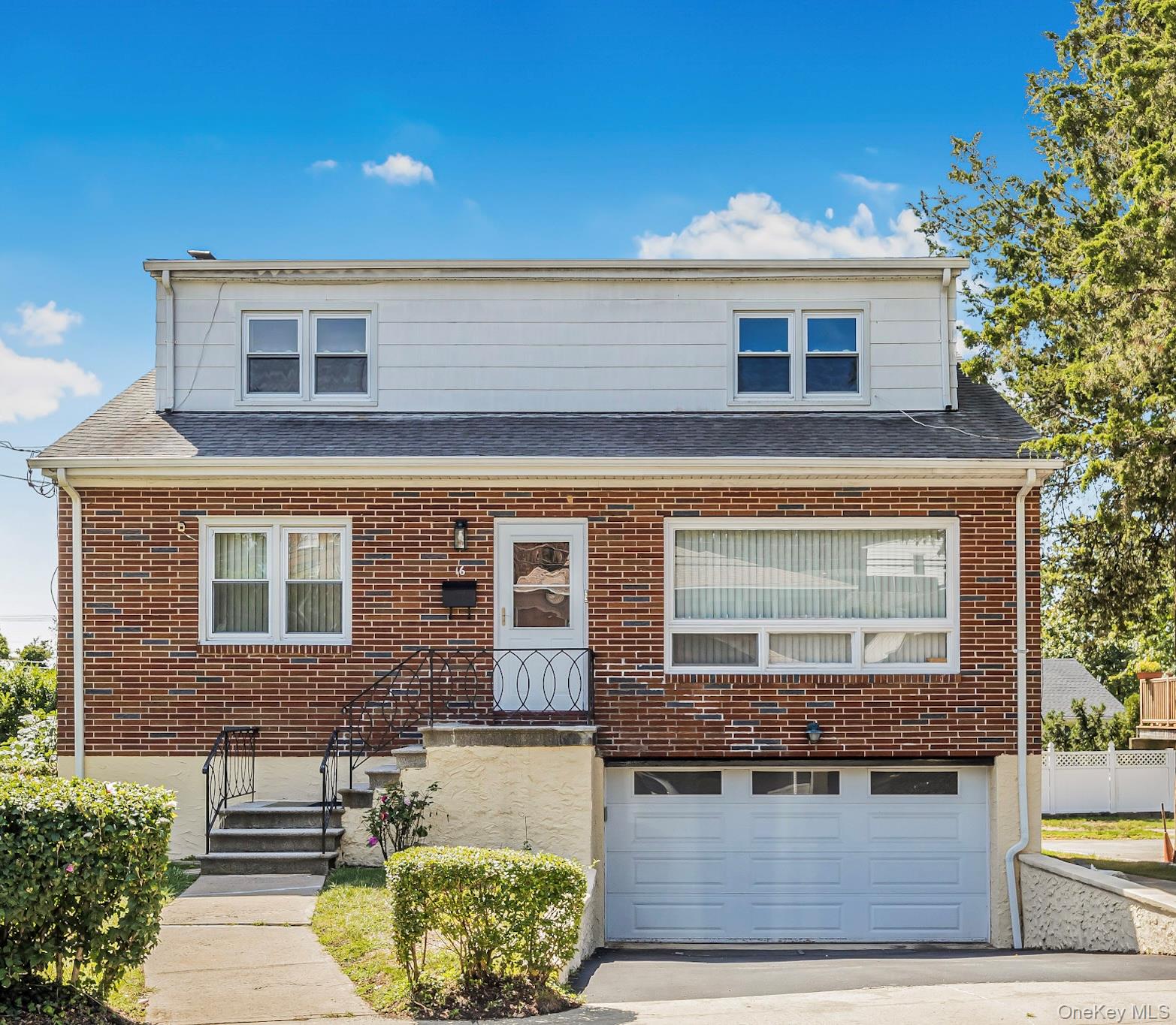 Welcome to this single-family residence in a tree lined neighborhood o...