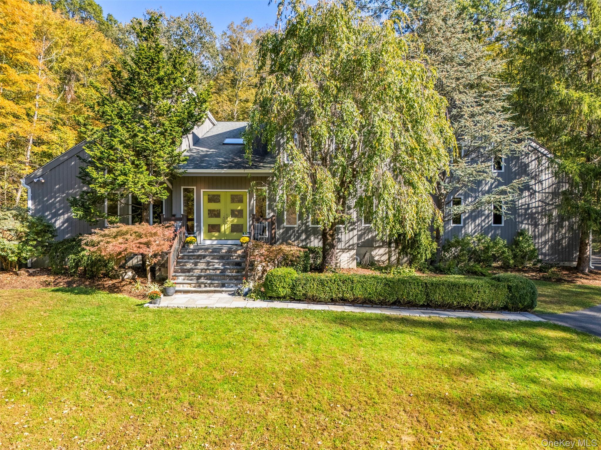 Beautifully set on 4 bucolic acres in South Salem, this impeccably mai...