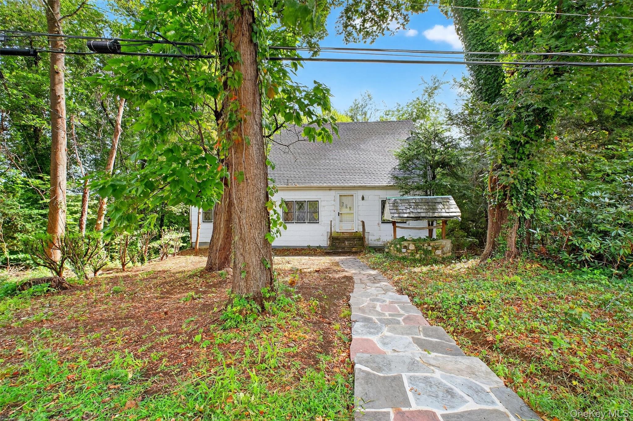 Bring your vision! Bursting with potential, this home is ready for a r...