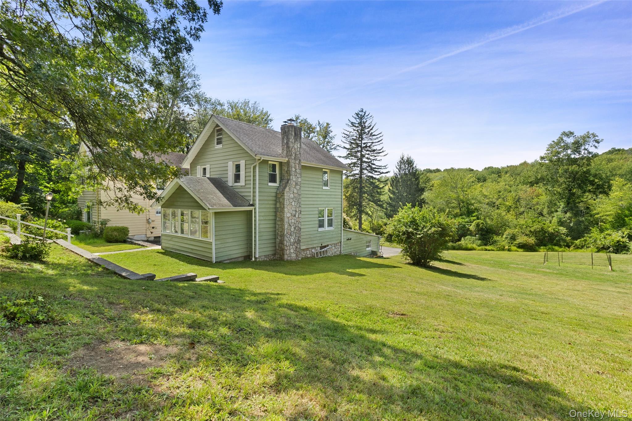 Welcome to 136 Harriman Rd., Mount Kisco, New York. This Charming Full...