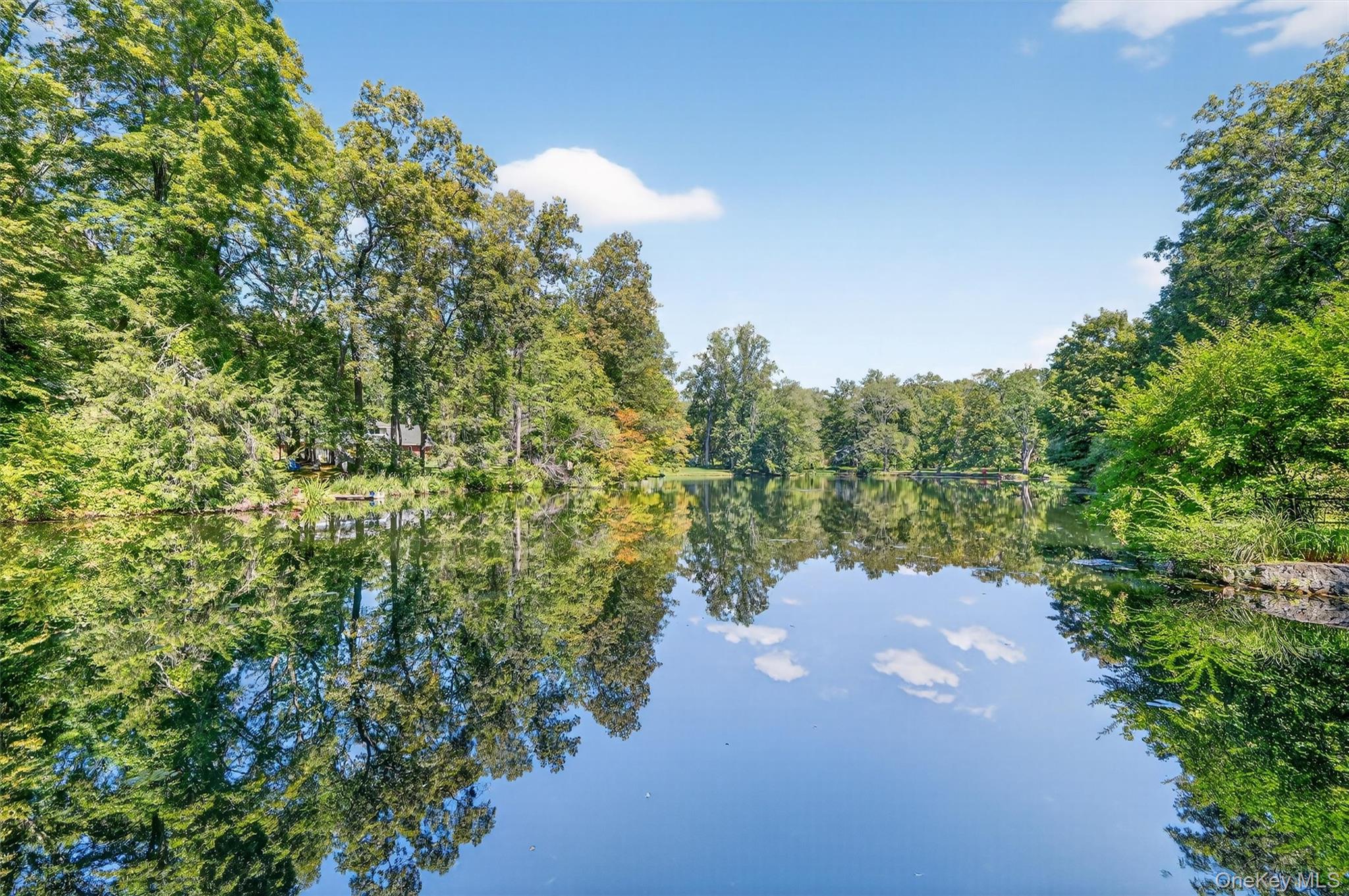 Set in a park-like setting with gorgeous grounds, this home offers a r...