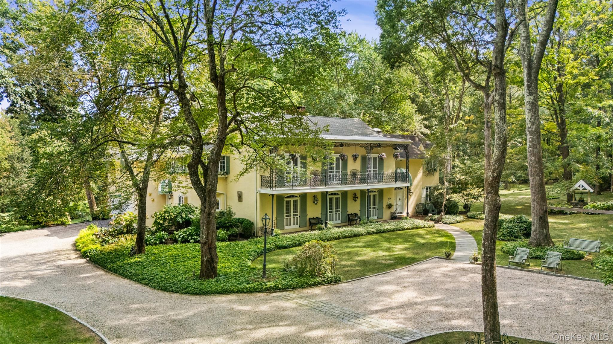 The Quintessential Getaway. Long, gated drive through spectacular grou...