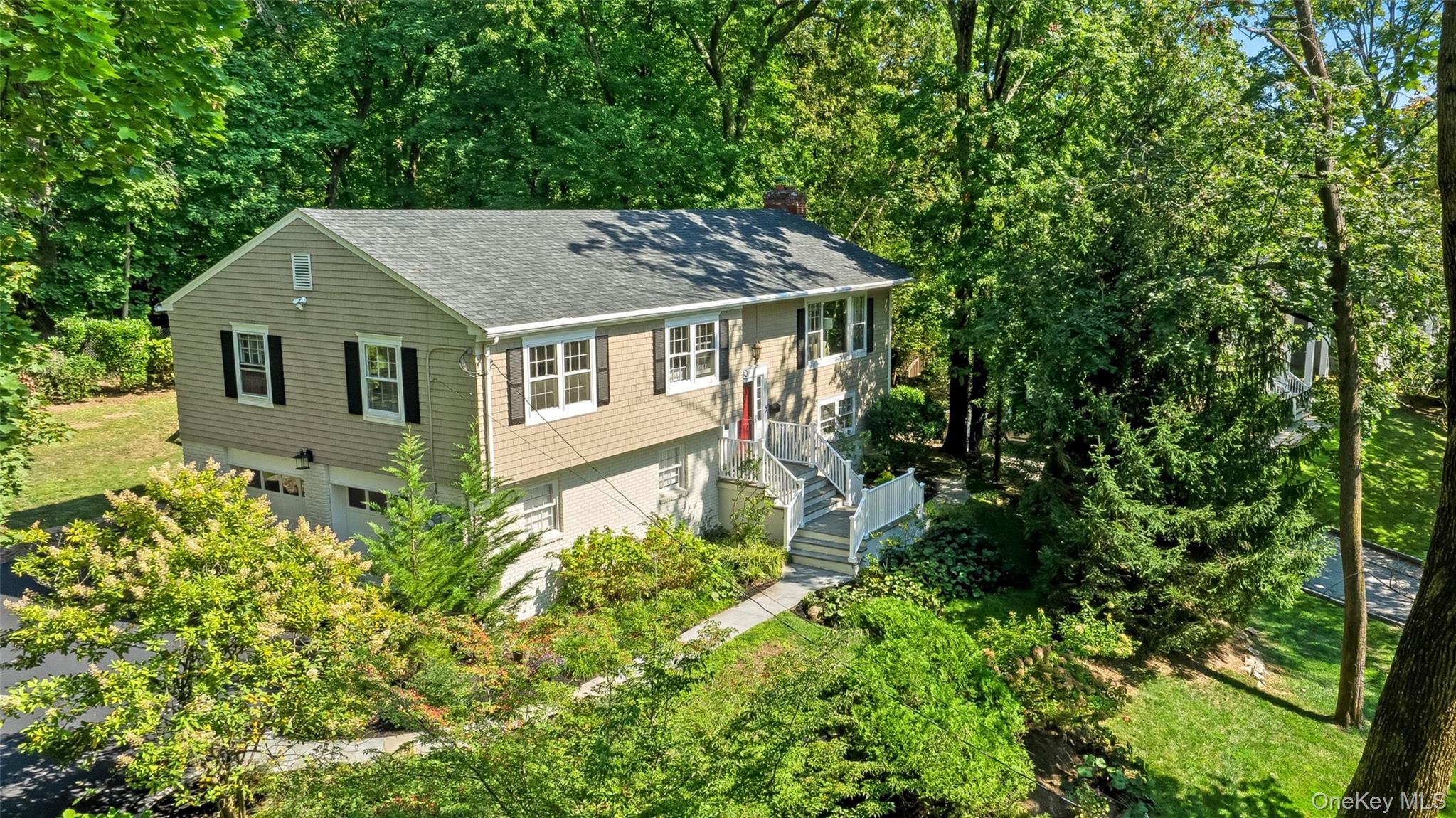 Set back and high above North Street on .38 ac, #80 is private & quiet...