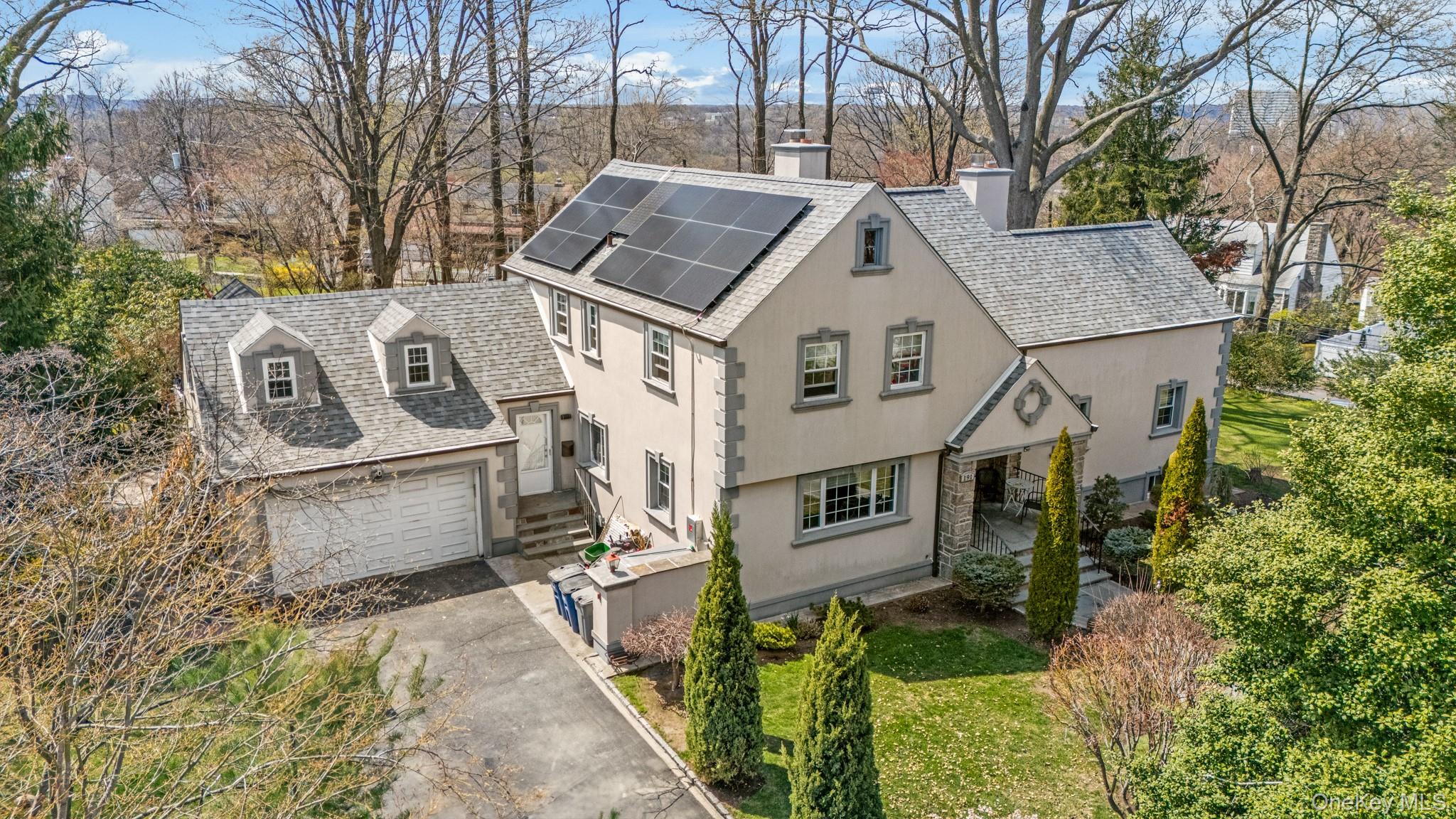 Welcome to a home of unparalleled elegance and comfort at 191 Dunwoodi...