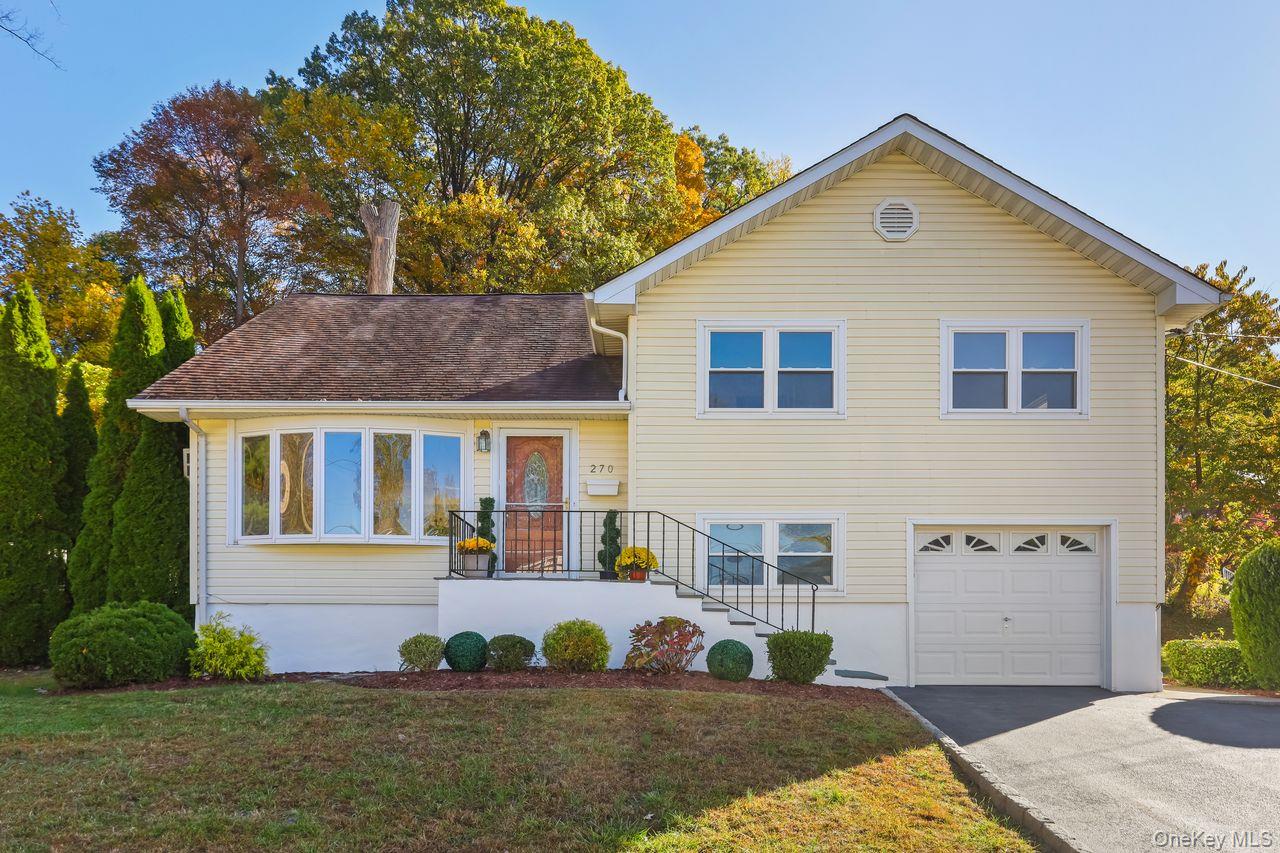 Welcome to this beautifully maintained split-level home, ideally situa...