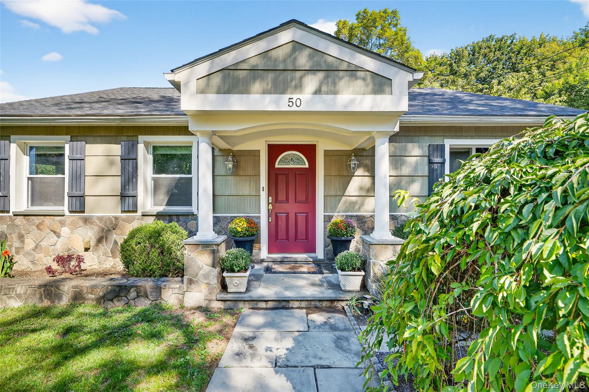 Welcome to 50 Woodland Road, a thoughtfully updated Ranch-style home o...