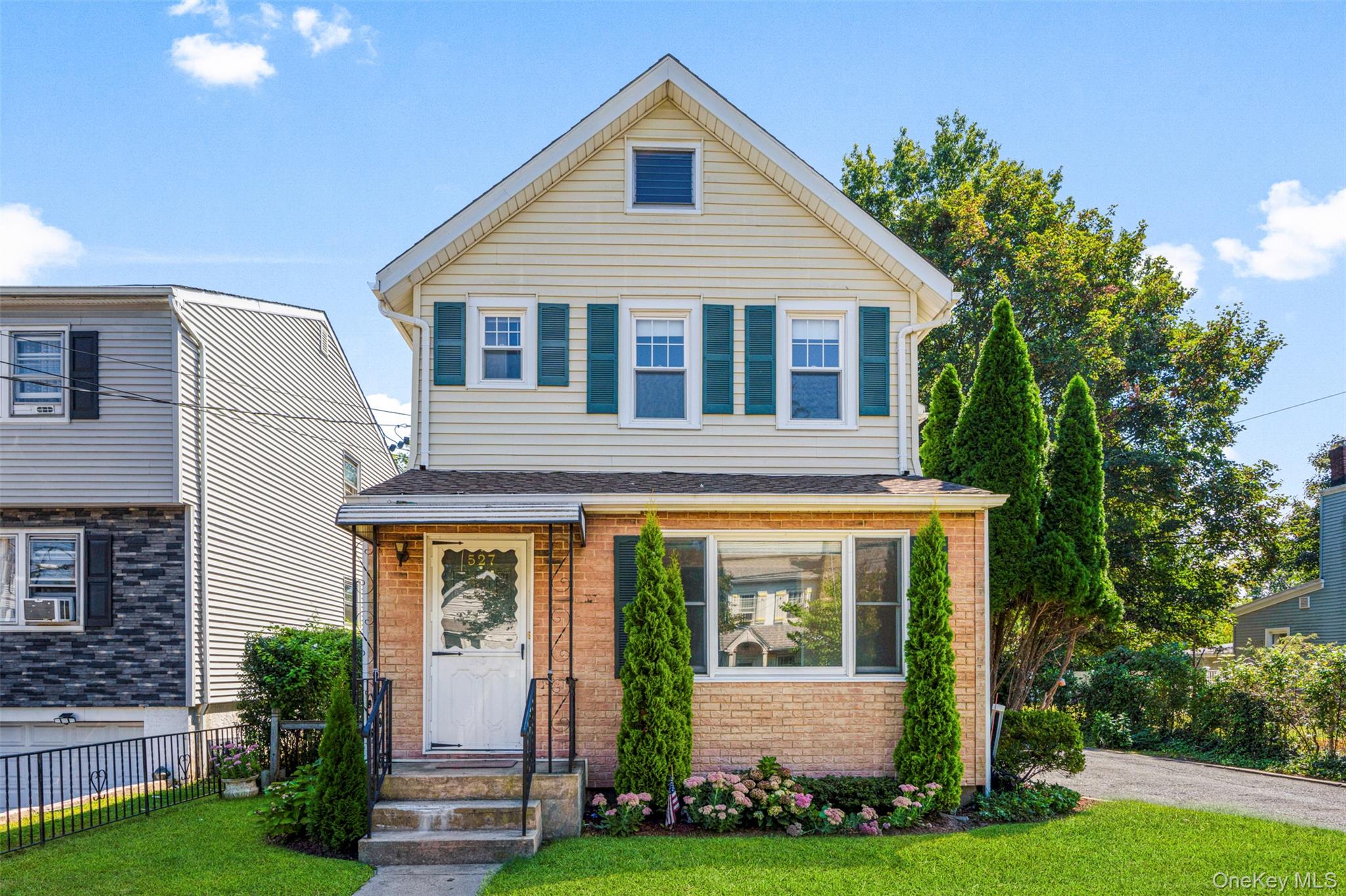 Welcome to this inviting home nestled in the sought-after Rye Neck Sch...