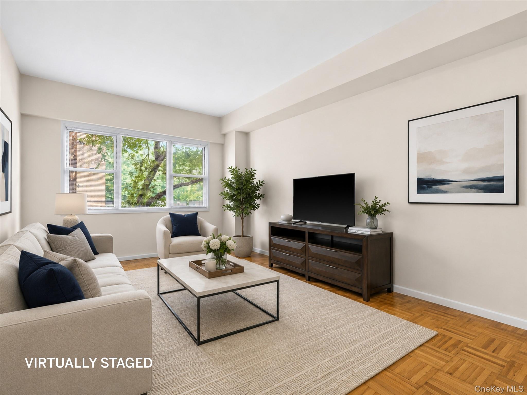 Welcome to this beautifully renovated first-floor apartment in the hig...
