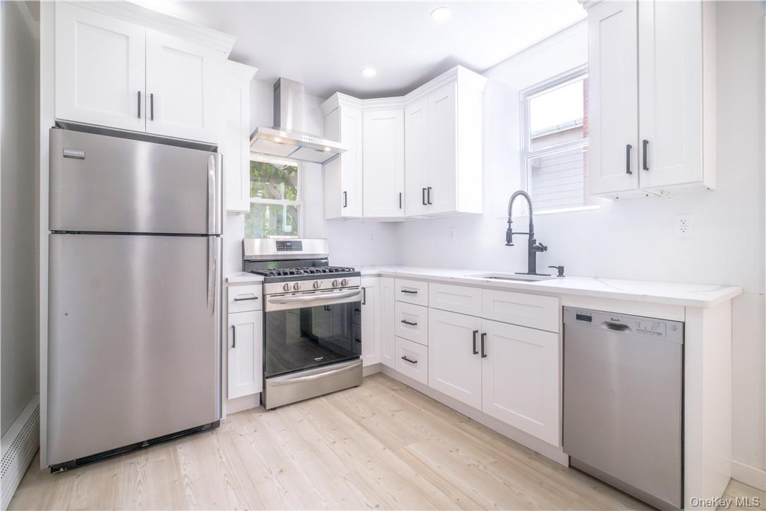 Experience the charm of this completely renovated one-bedroom apartmen...