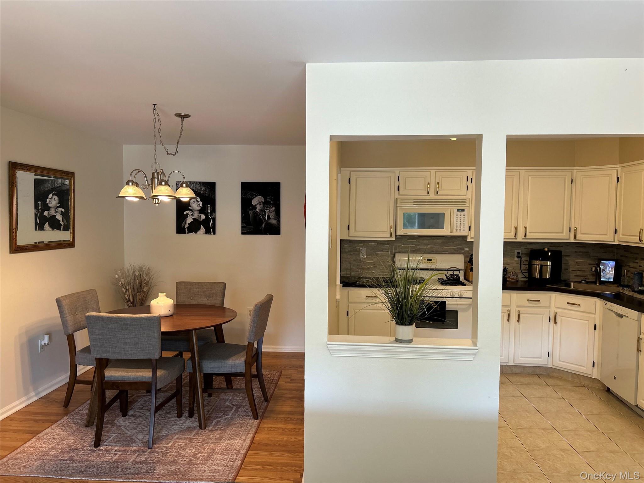 This inviting second-floor condominium seamlessly combines comfort and...