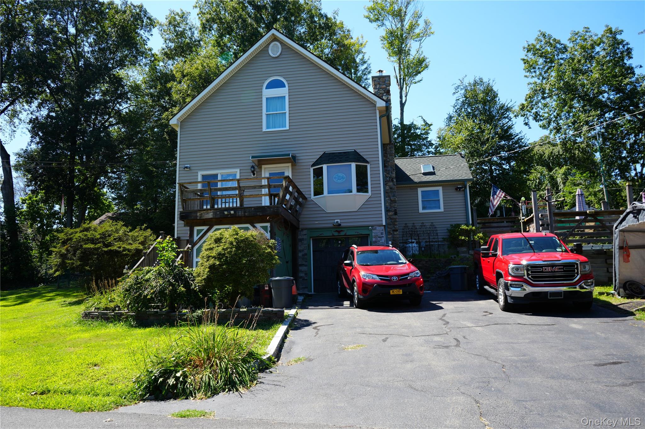 Welcome to 27 Spruce Street in the desirable Lake Peekskill community!...