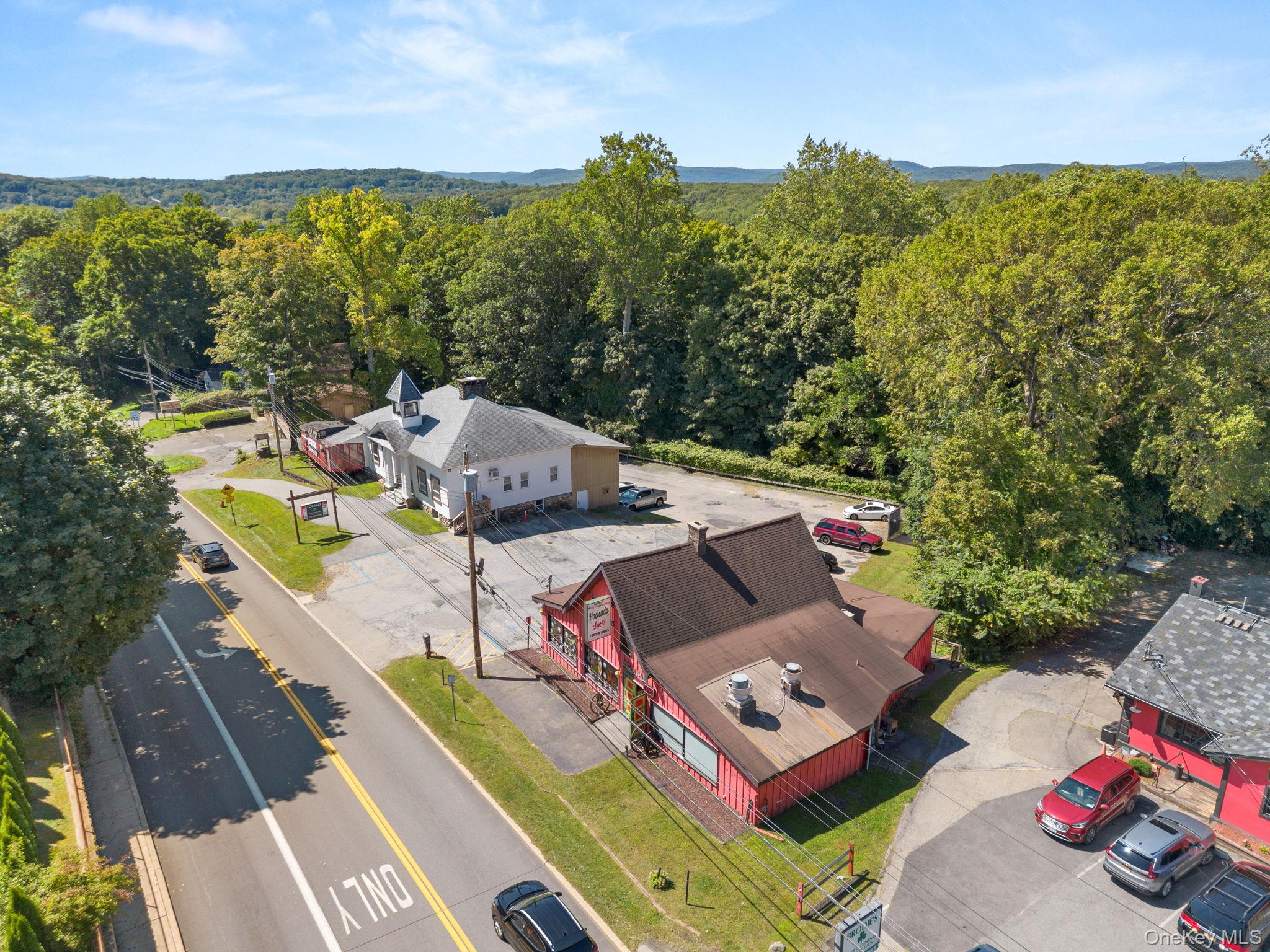 Strategic Opportunity to purchase  2 Buildings On a Busy Road W/30,000...