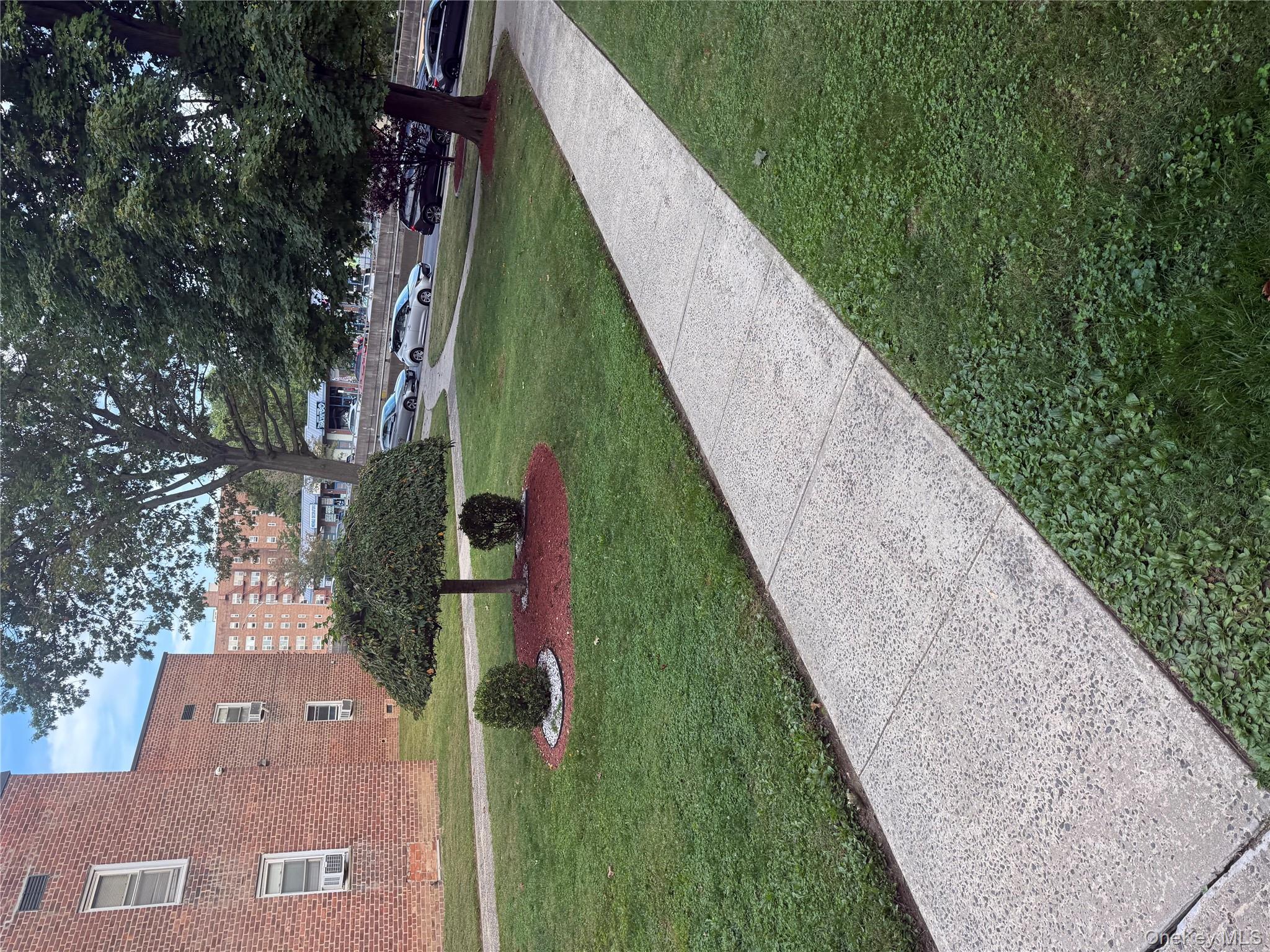 Nestled on the second floor of a charming garden apartment complex, th...