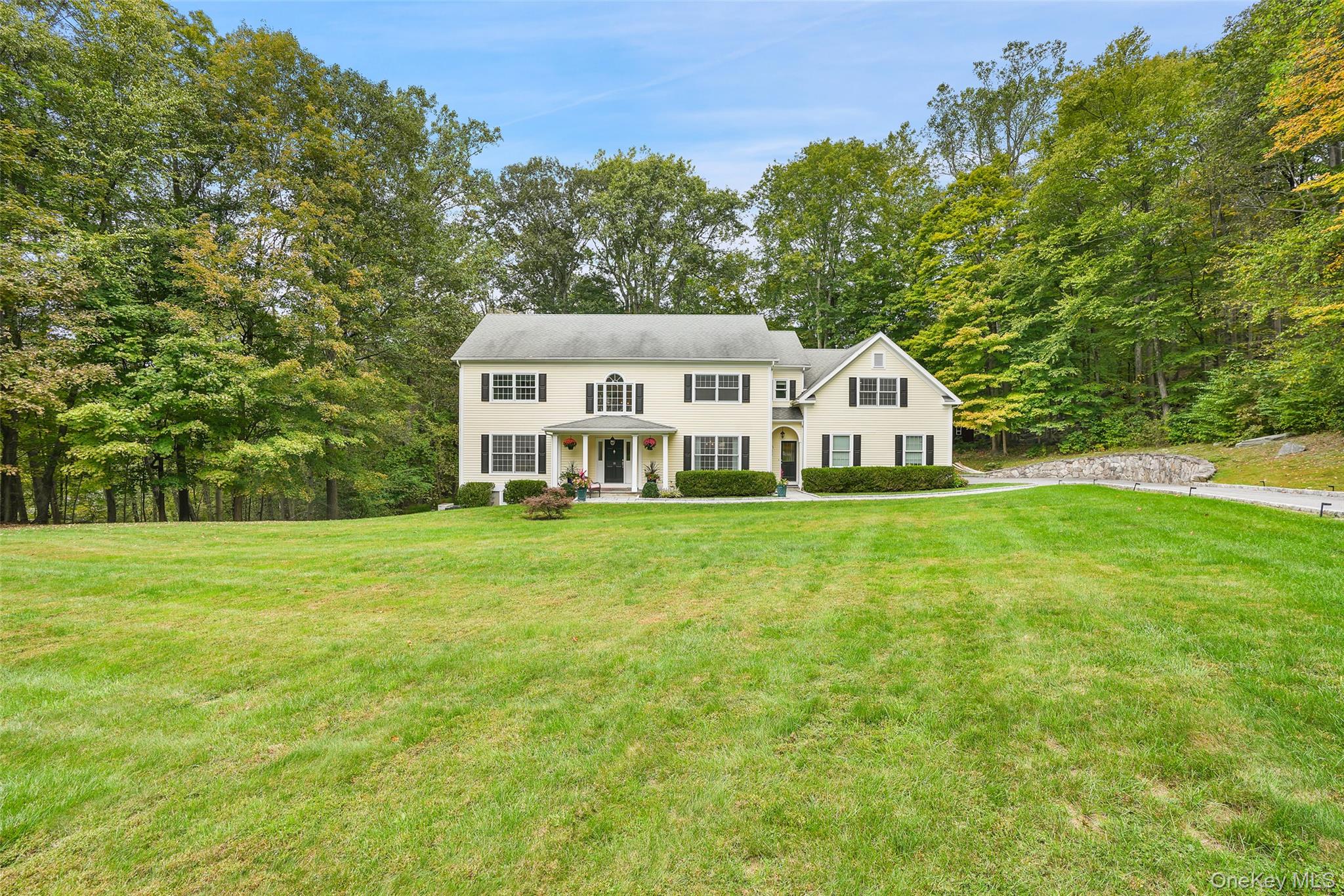 The Perfect Country Colonial. Peaceful setting at the end of a desirab...