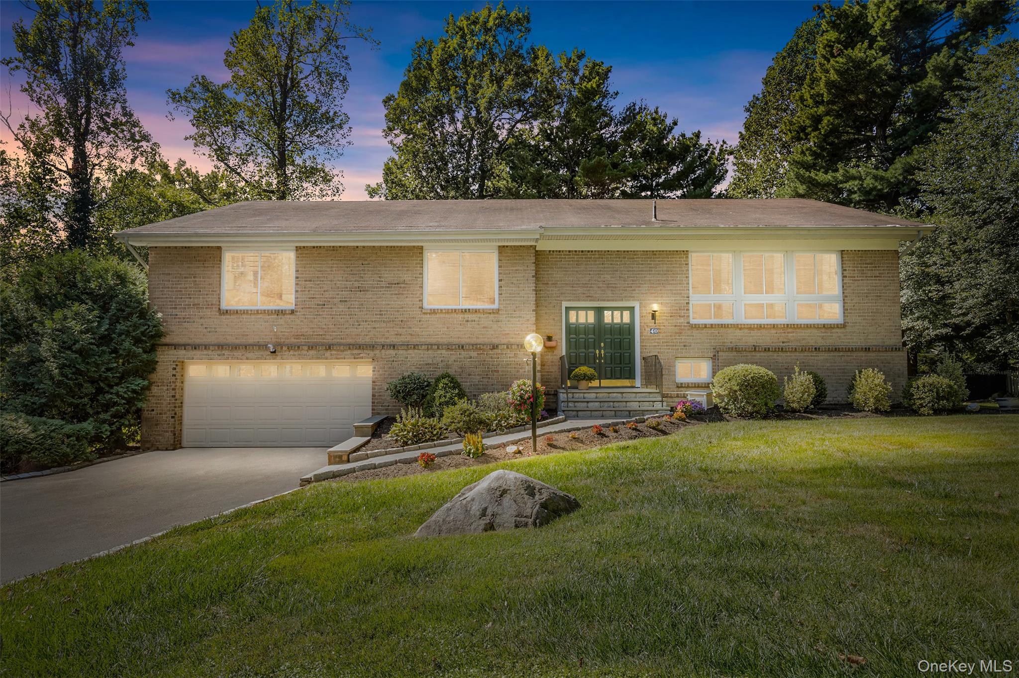 Gracefully nestled on nearly half an acre of lush, landscaped grounds,...