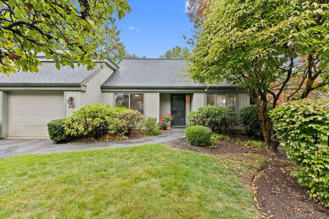 Make this Armonk one-level end unit yours today!  In this bright home,...