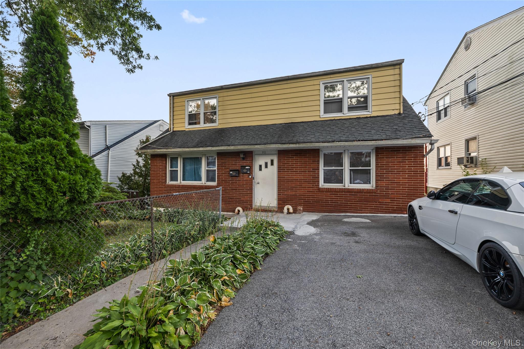 Welcome to this well maintained two-family duplex, ideal for both home...