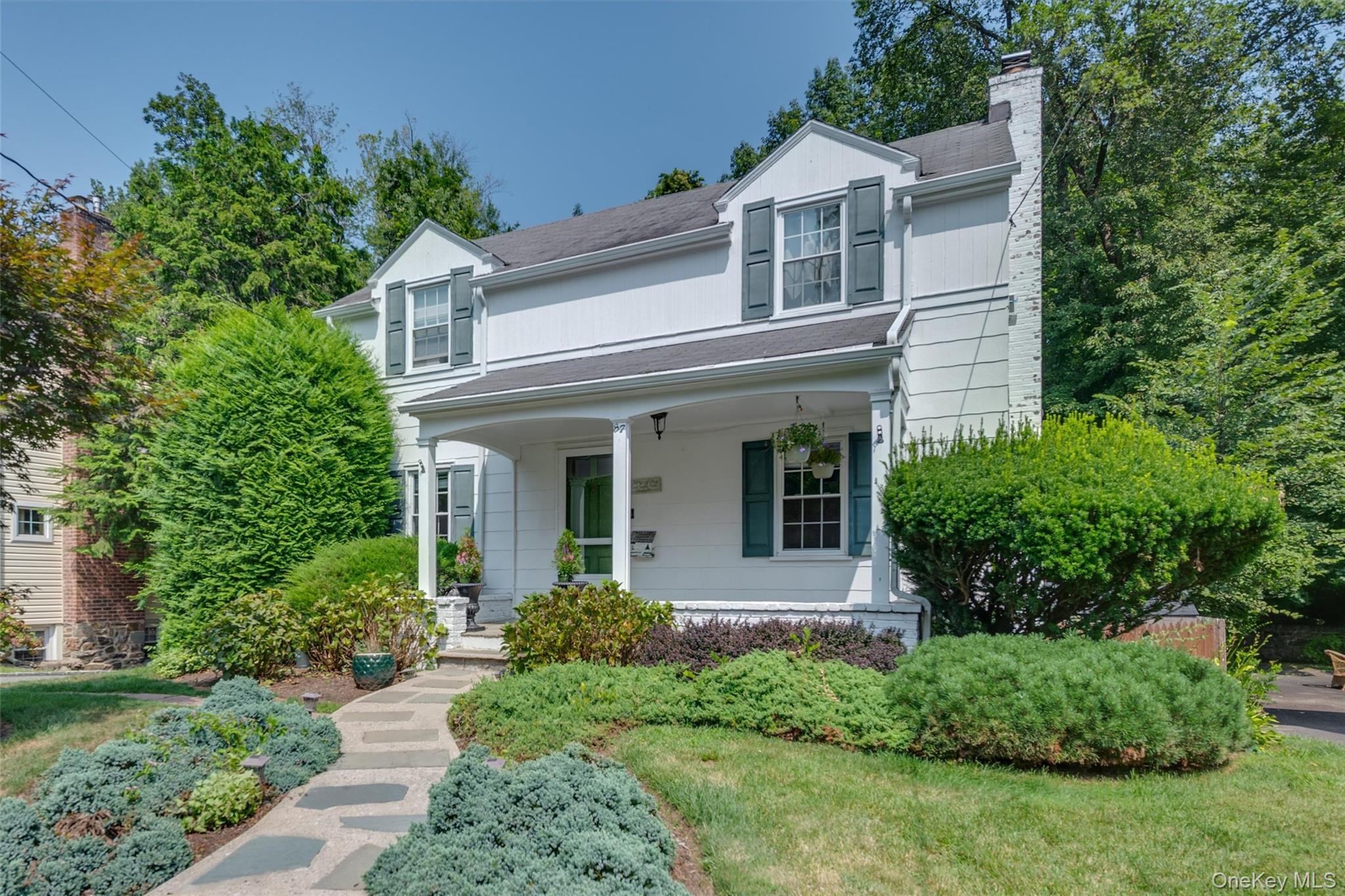 Nestled on a quiet street surrounded by New Rochelle's Nature Study Wo...