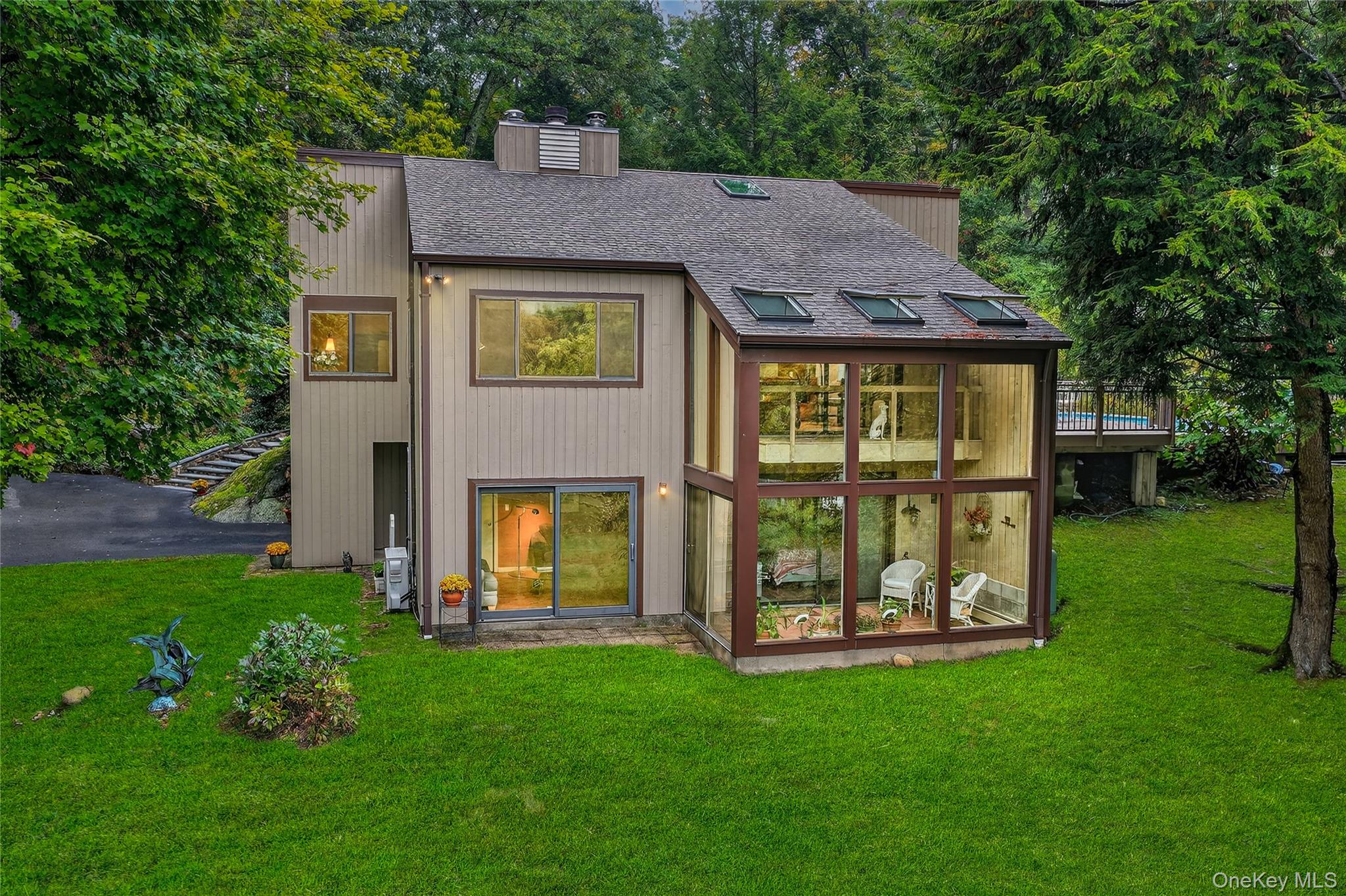 Dramatic Contemporary sighted high on the property. While driving up t...