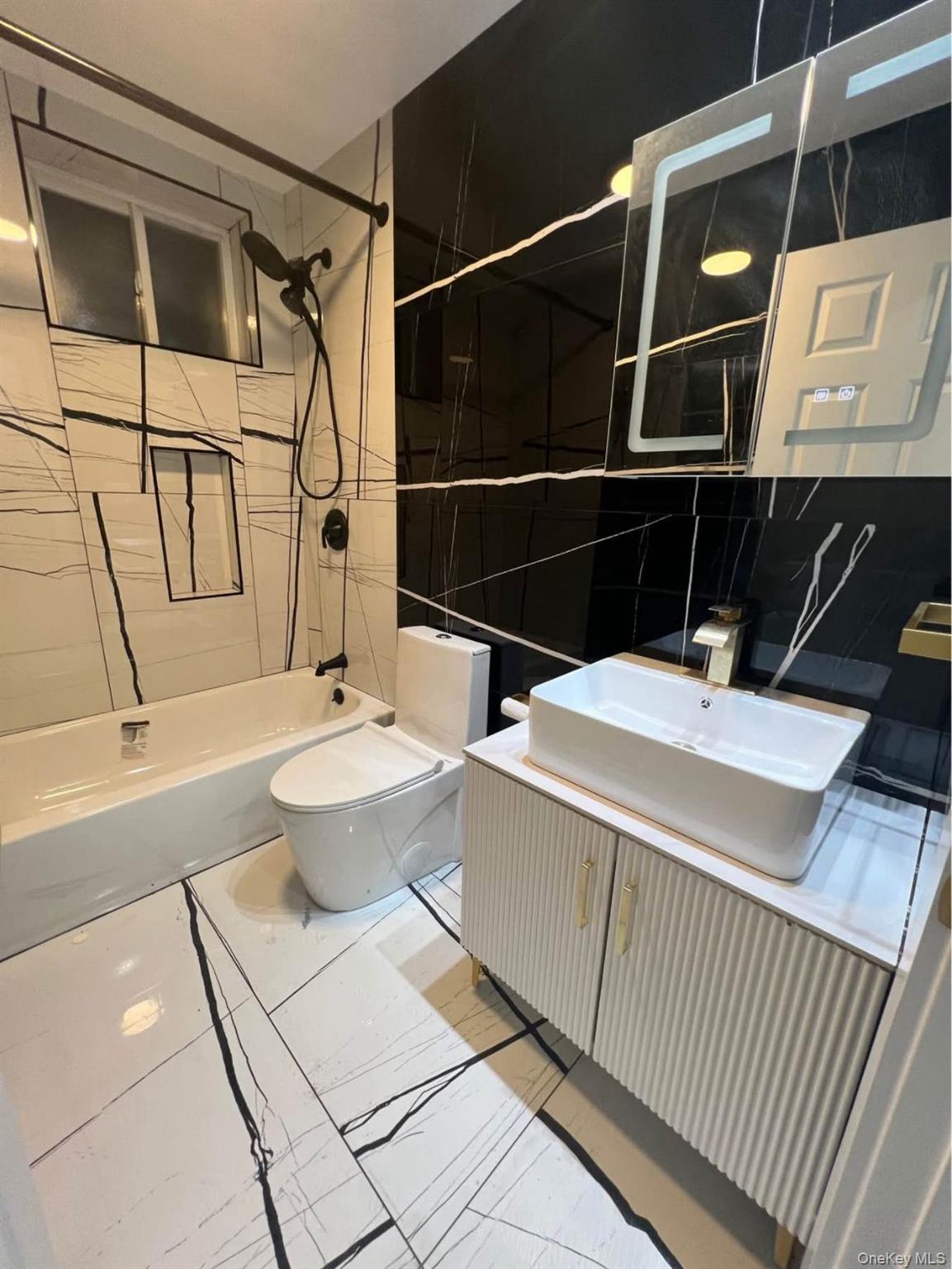 This stunning first-floor apartment offers an entire floor of privacy...