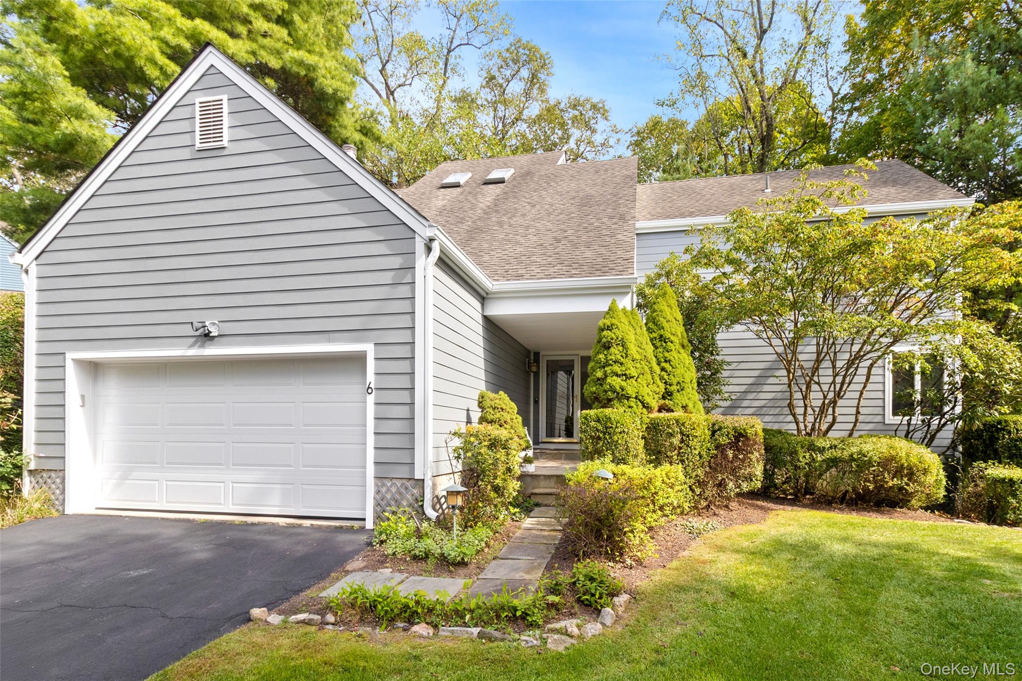 This elegant colonial-style residence is located within the prestigiou...