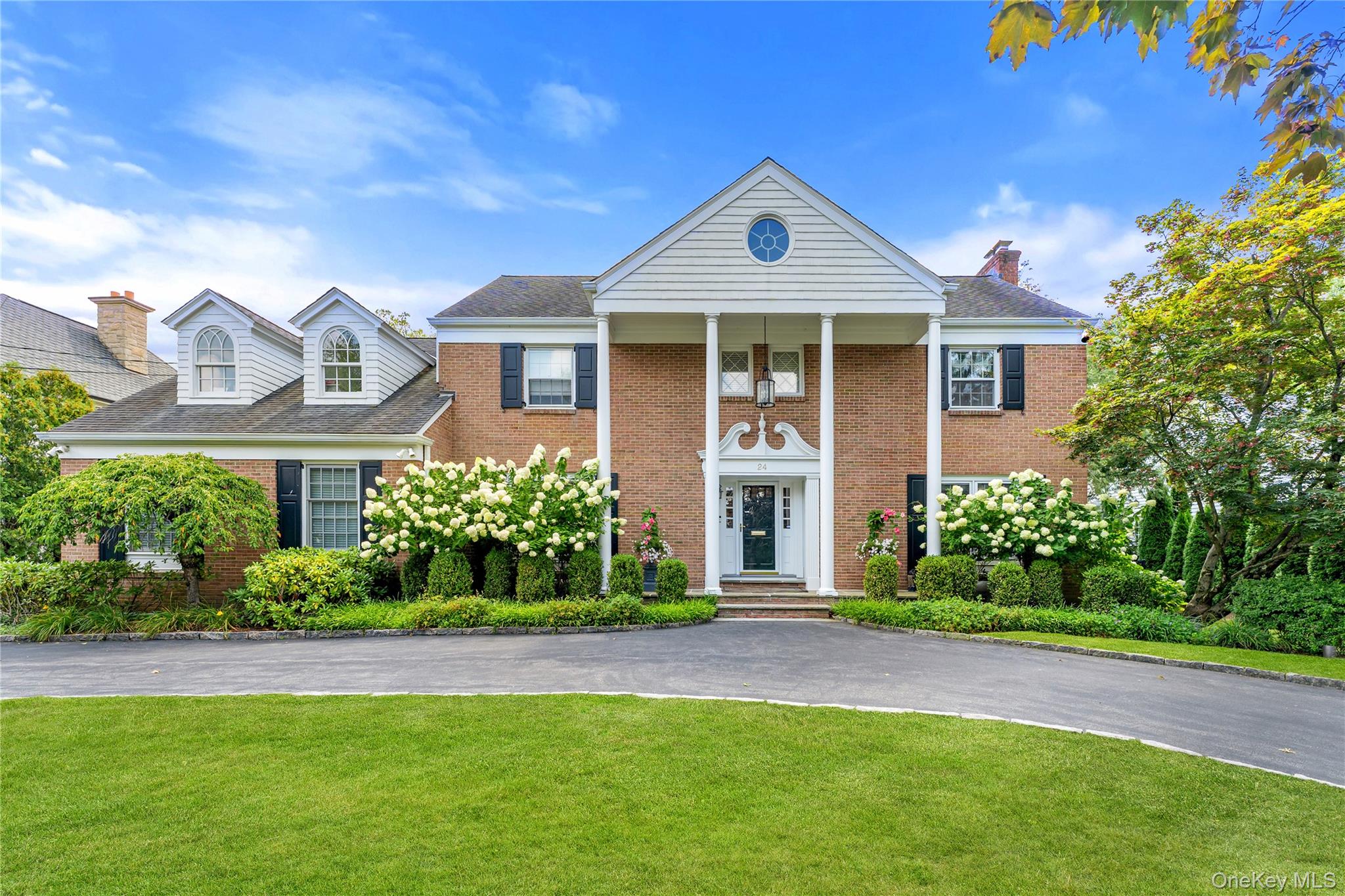 Rarely does this much house, land, and privacy come together in Scarsd...