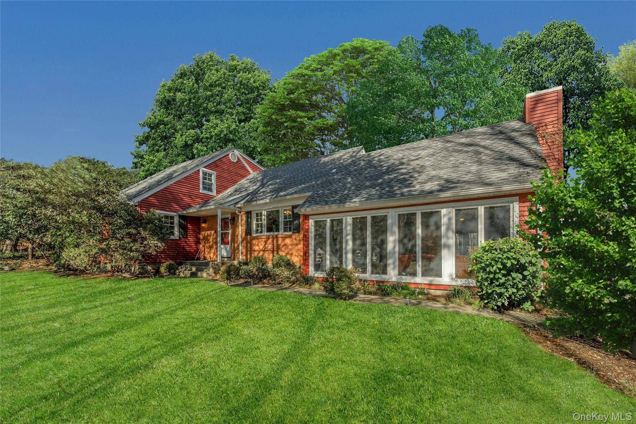 Welcome to Katonah Ridge! This 4-bedroom, 3-bath former model home off...