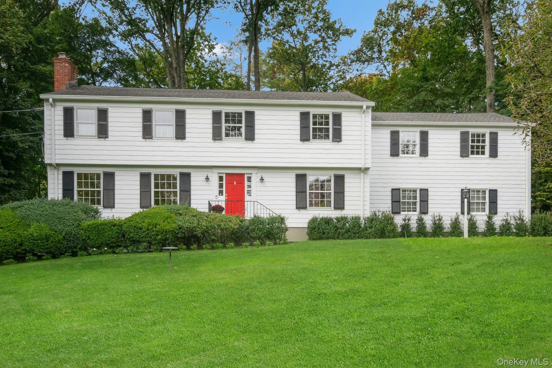 Beautiful and gracious center hall colonial set on 1.38 acres in an es...