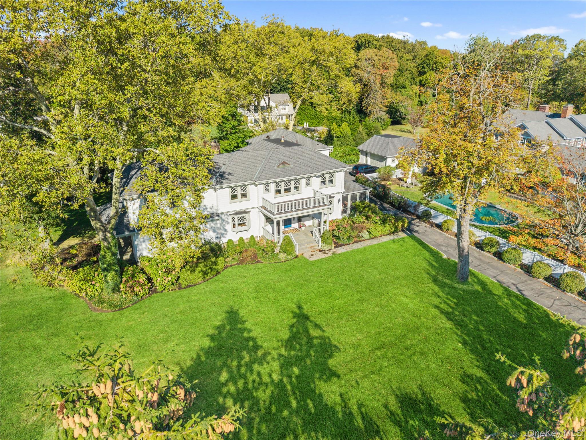 Welcome to 915 Skibo Lane, a distinguished Orienta Point estate offeri...