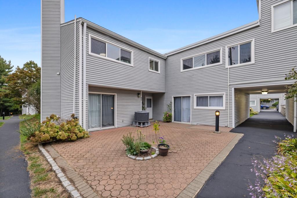 Rare 3-bedroom, 2-bath unit in sought-after Bedford Mews. This sun-fil...