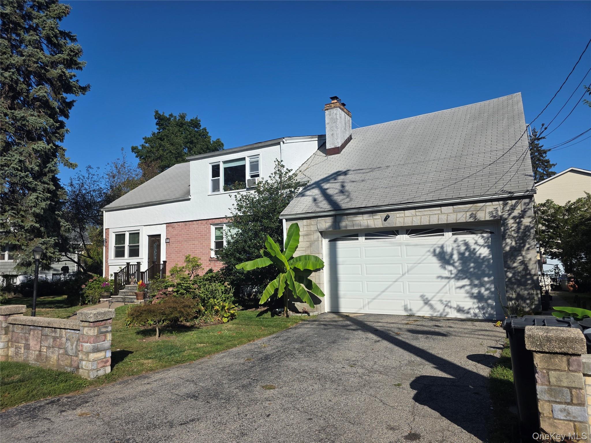 Fabulous Gem! Unique 3 Family Cape style home that features 2 (2bdrm u...