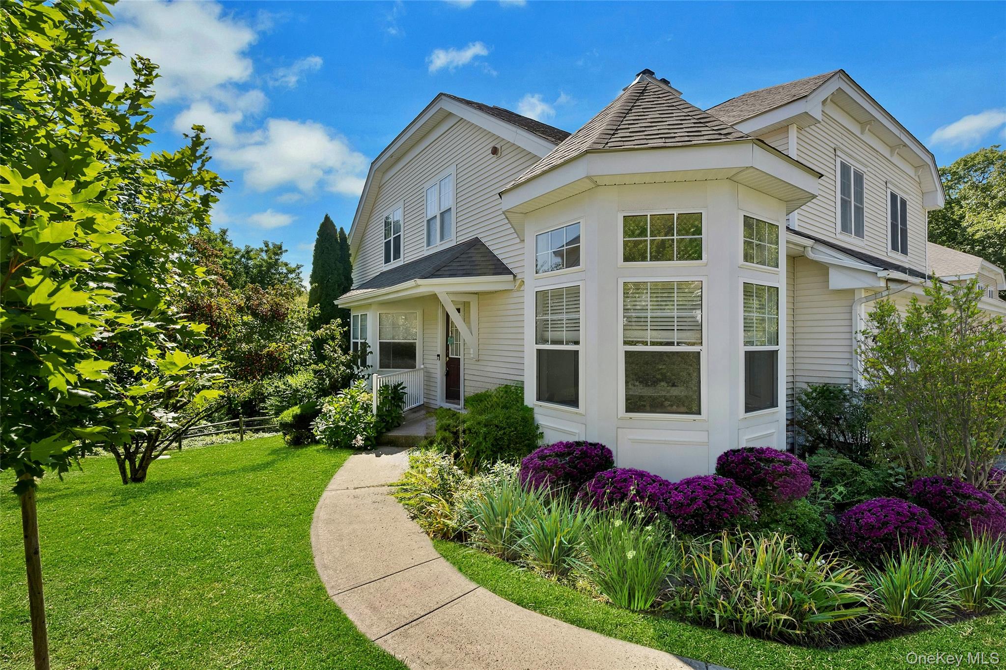 Rare offering in award-winning Ginsberg designed Winding Ridge! This f...