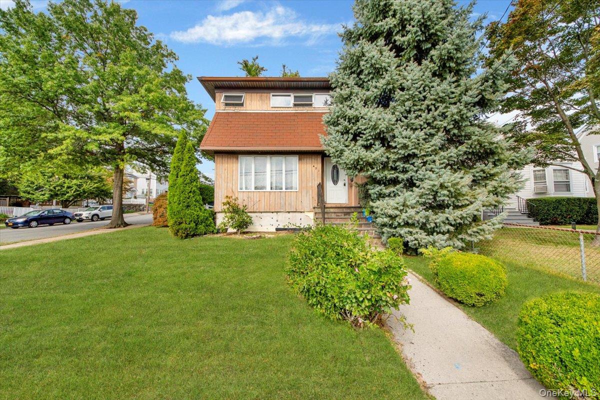 Welcome to 431 Irving Avenue — a home full of possibility, ready to be...