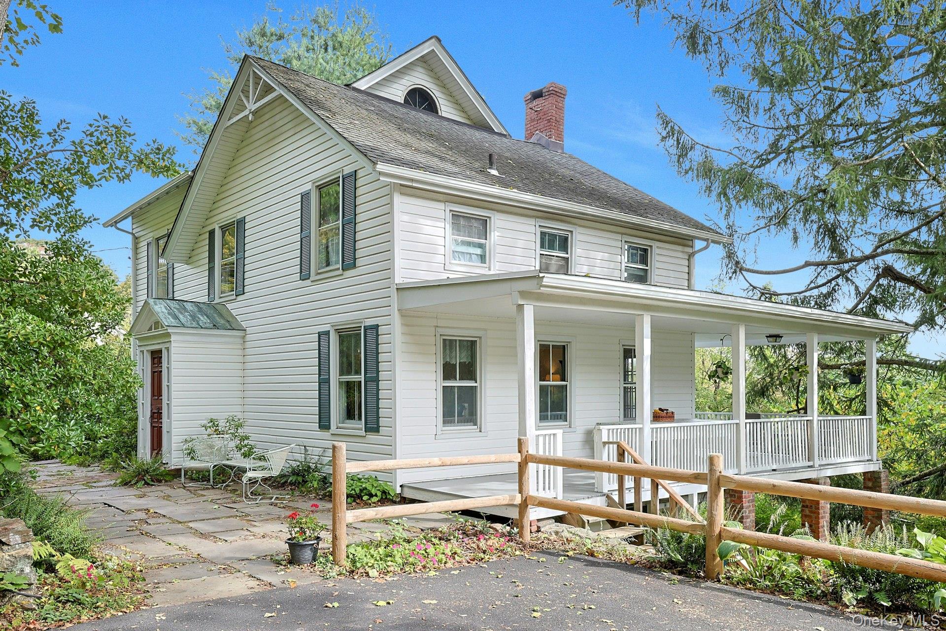 Welcome home to this enchanting 1800s Colonial Farmhouse, brimming wit...