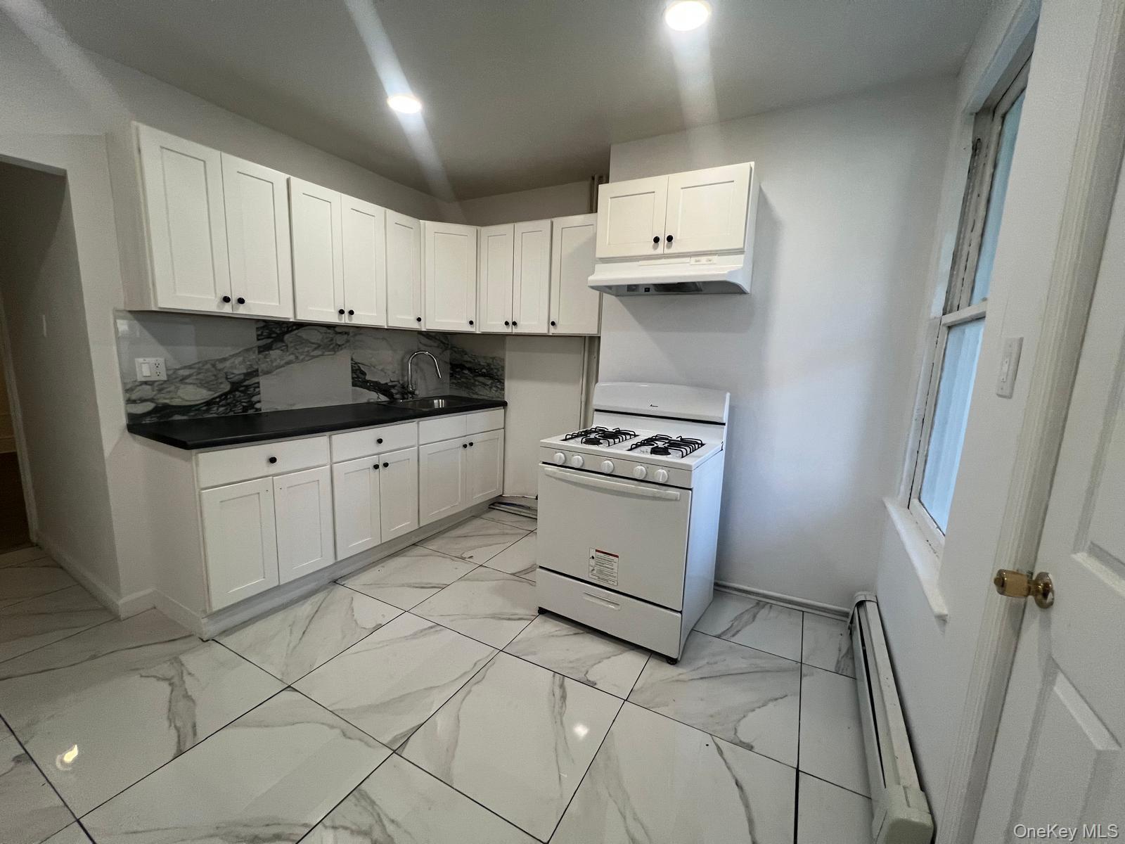 Newly renovated 3 bedroom, 1 bath railroad-style apartment with large...