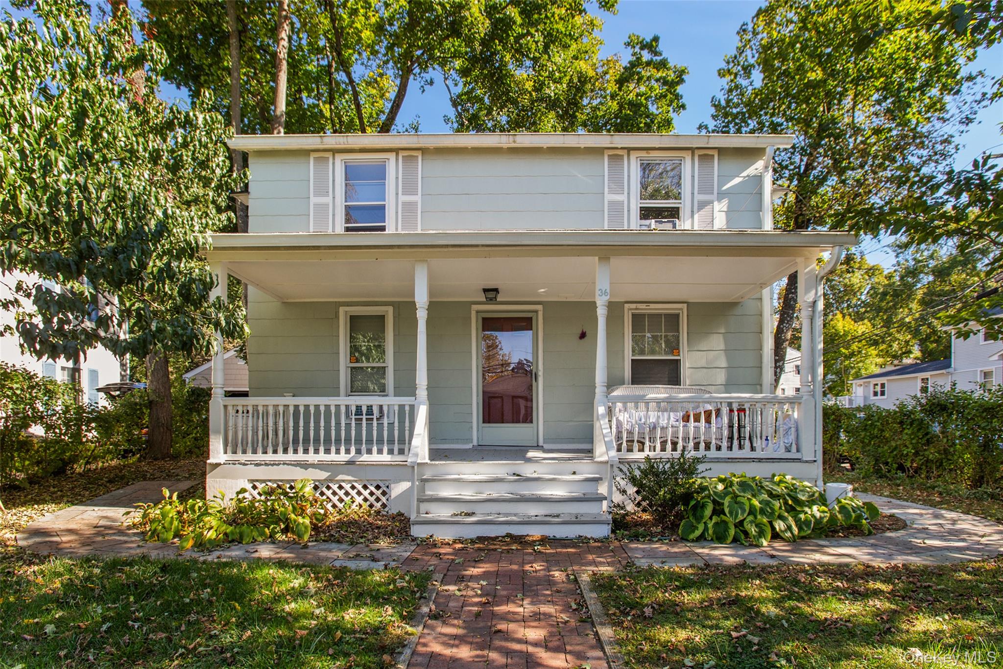 Enjoy this sun-filled 2nd floor apartment.  Walk to town, easy train c...