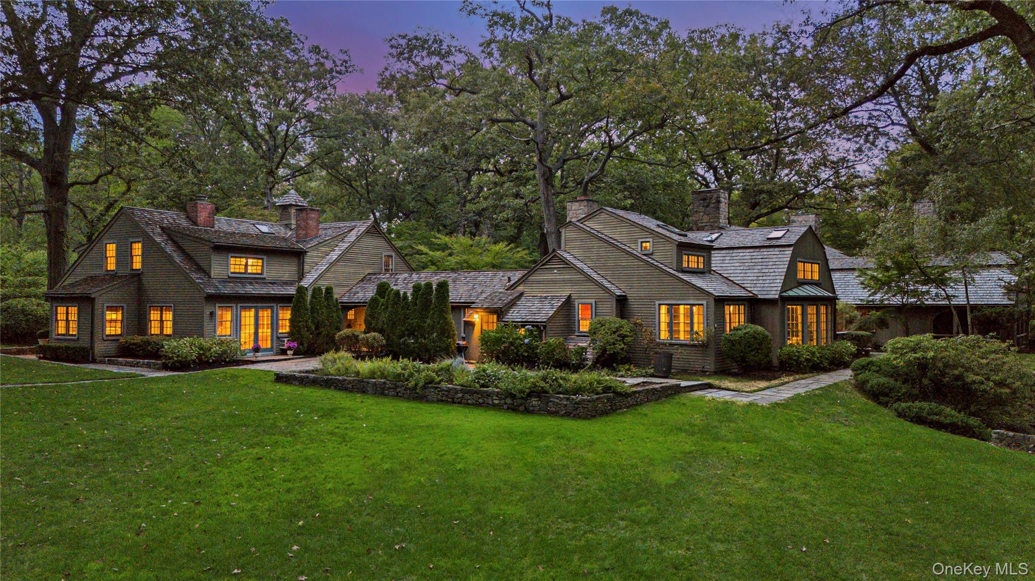 Set to 5.66 secluded acres, this iconic estate is a rare offering in W...