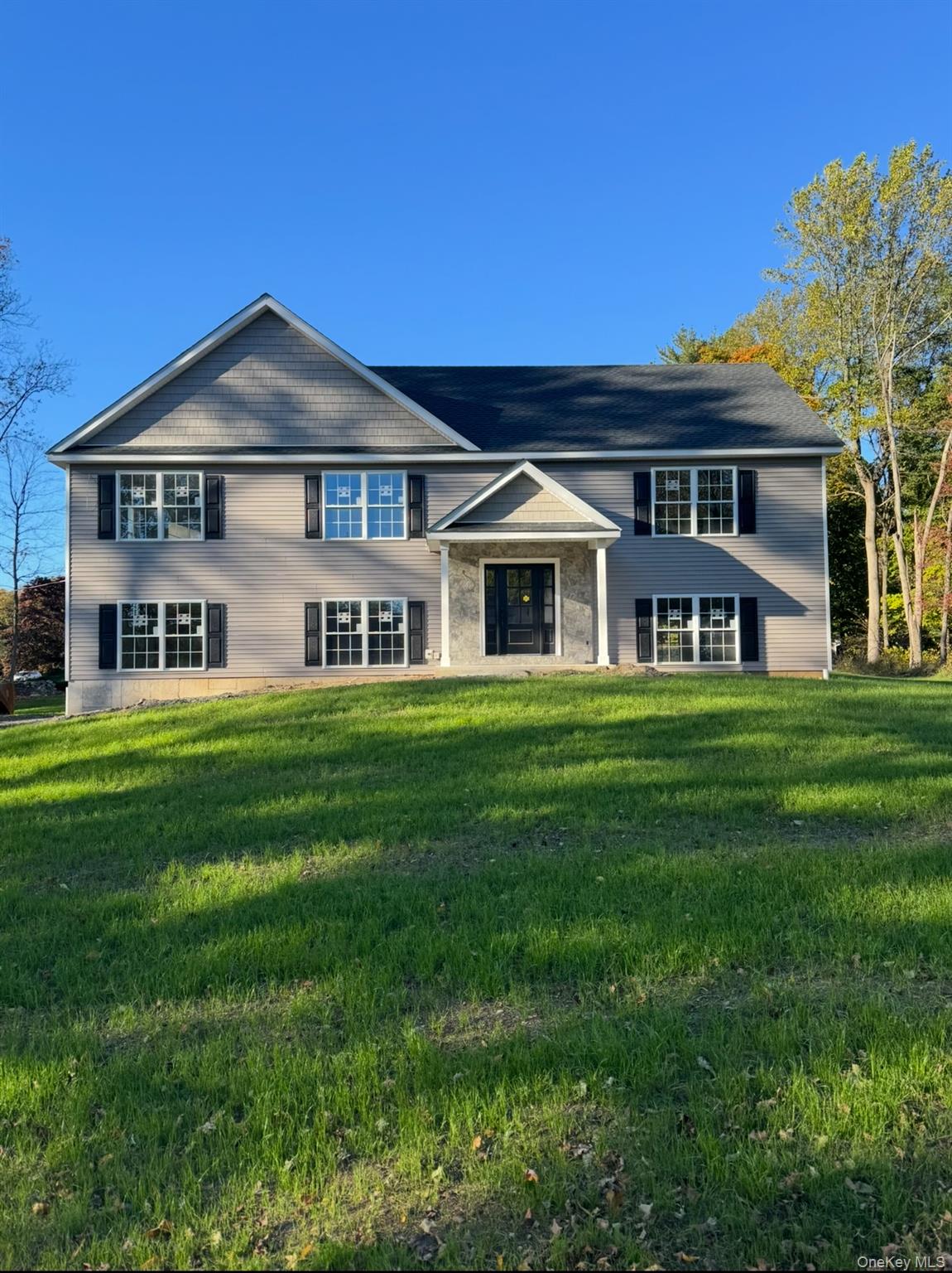 Welcome to your brand-new raised ranch! This thoughtfully designed hom...