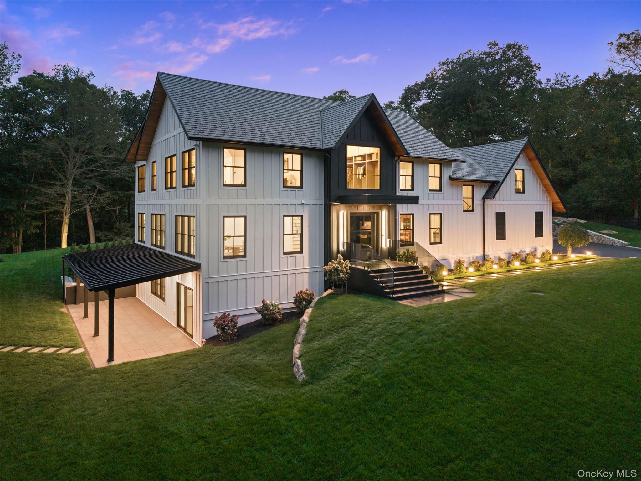 Welcome to 45 Pine Hill Drive, where modern luxury meets timeless soph...