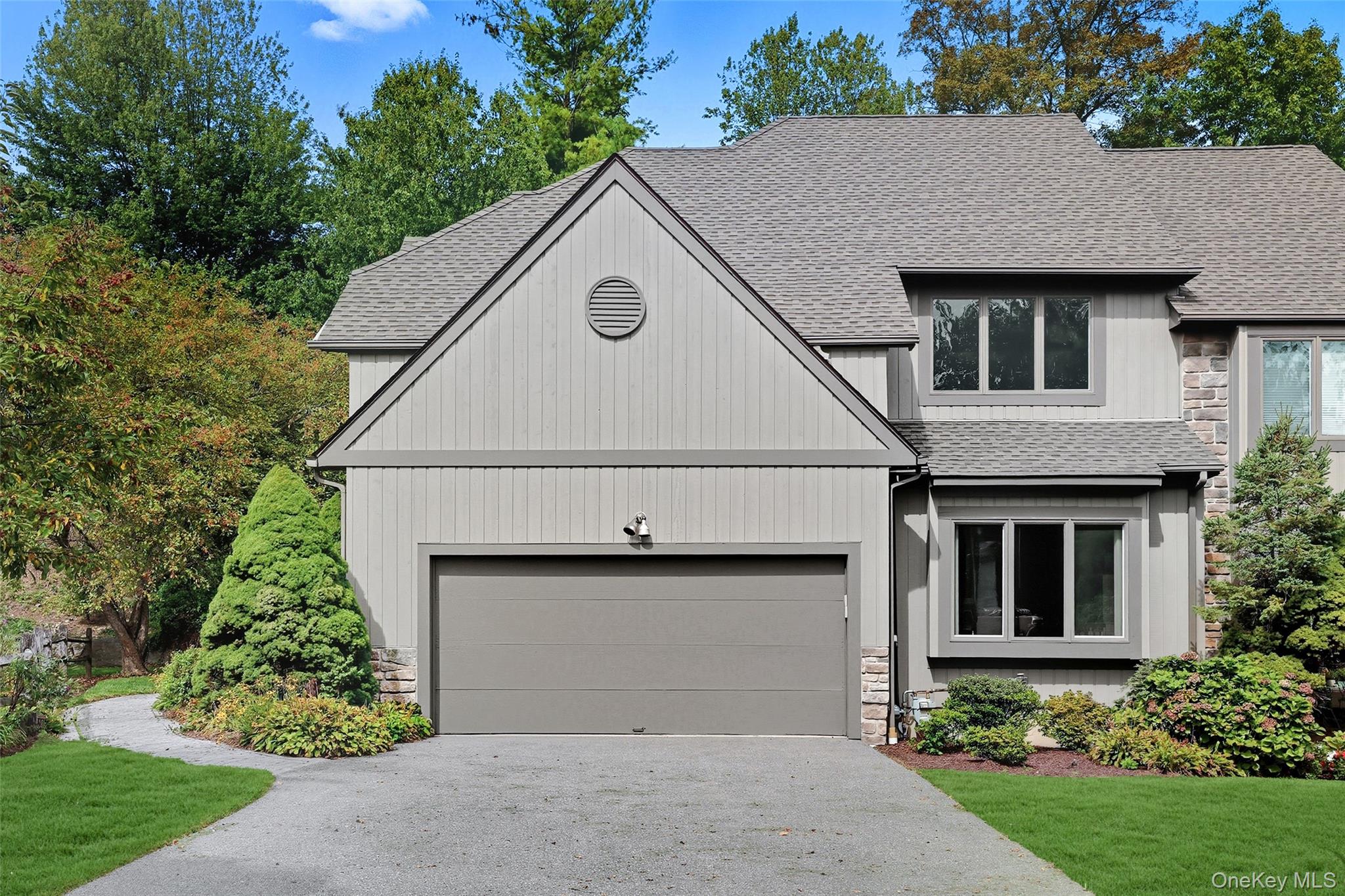 Impeccably maintained and truly move-in ready, this maintenance-free t...