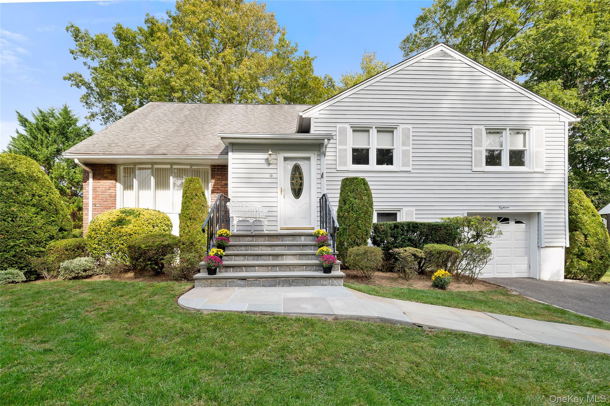 Welcome to this beautiful split-level home in the desirable Maplewood...