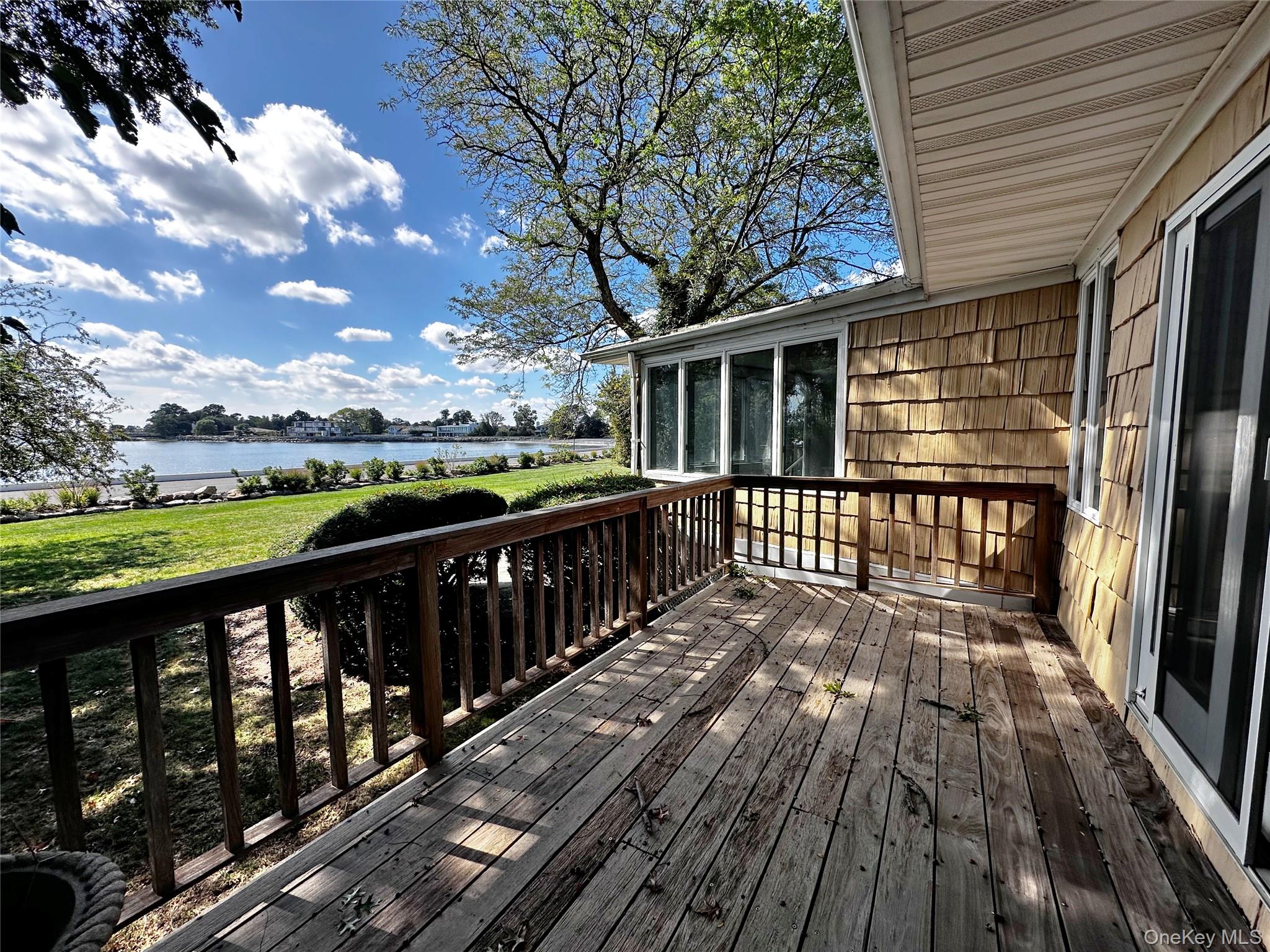 Resort-style living awaits on a peaceful Orienta cul-de-sac, where pan...