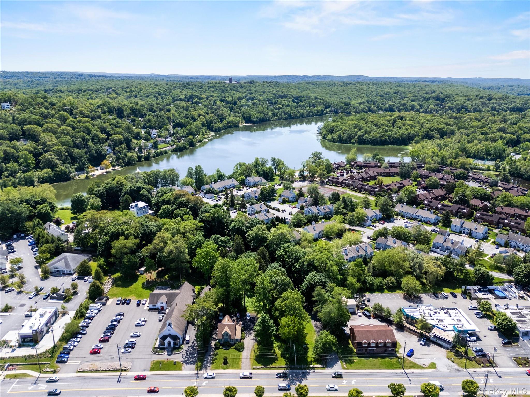 Rare 4.6-acre lake-adjacent development site with commercial frontage...