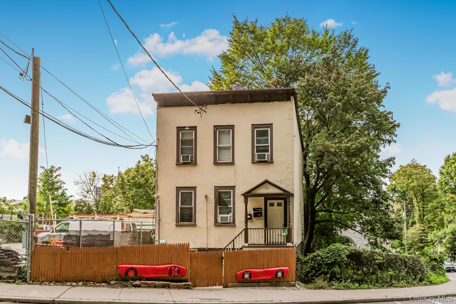Terrific opportunity to own a Legal 3 Family Stucco home in the vibran...