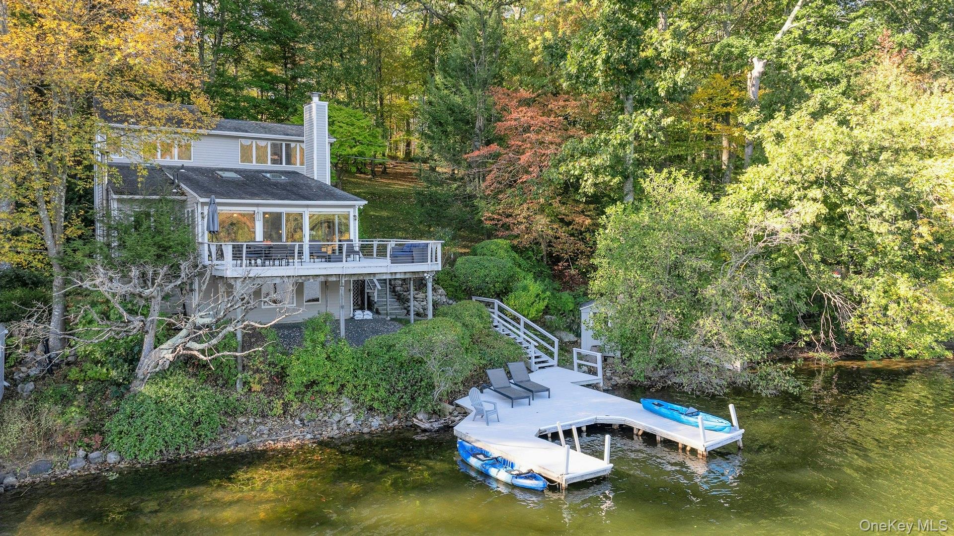 Magical lakefront retreat!  Spectacular well maintained contemporary h...