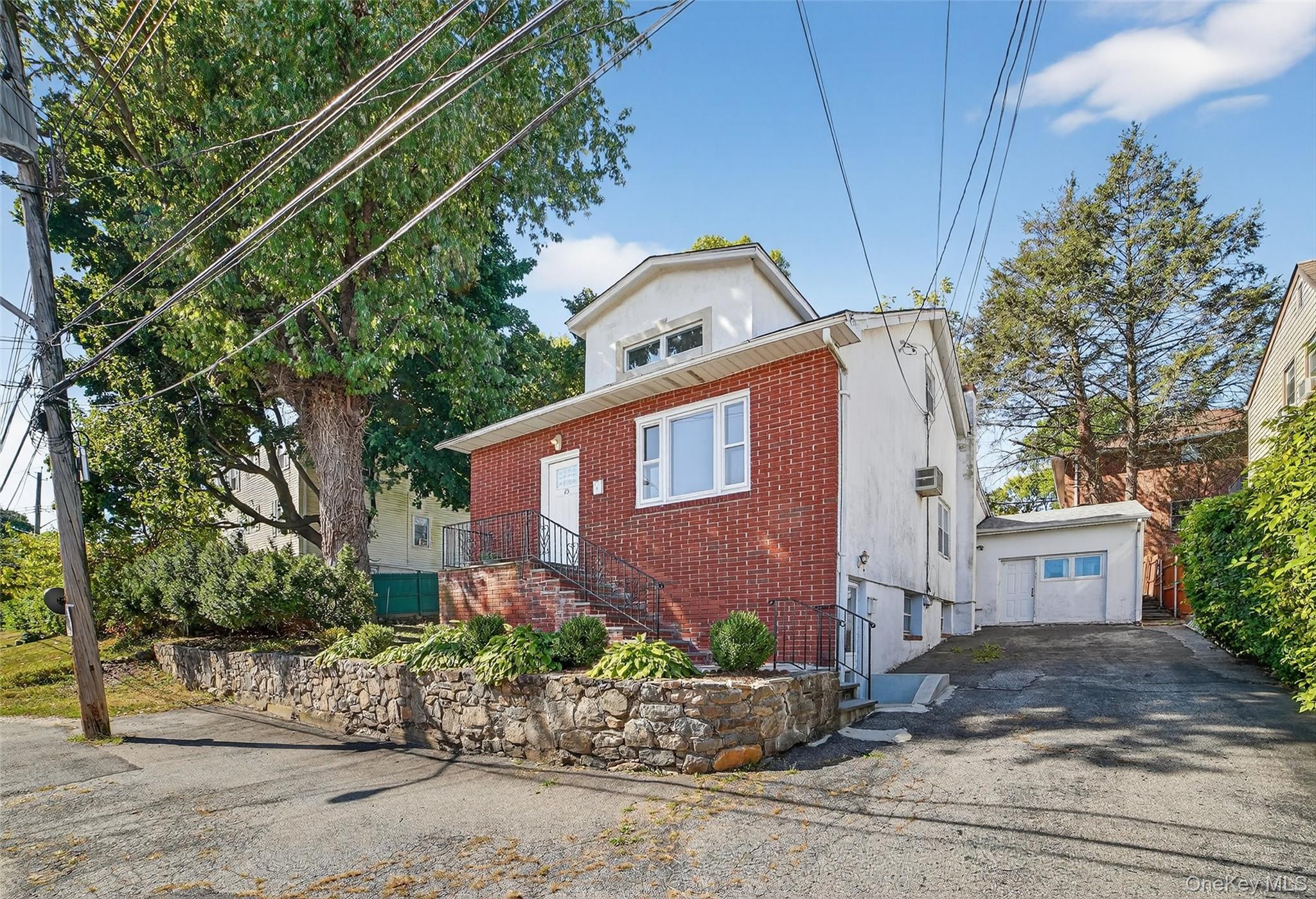 Discover a world of potential in this captivating 2 family, a perfect...